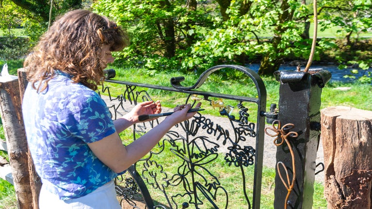 Tesni Calennig with one of the new gates in Beddgelert